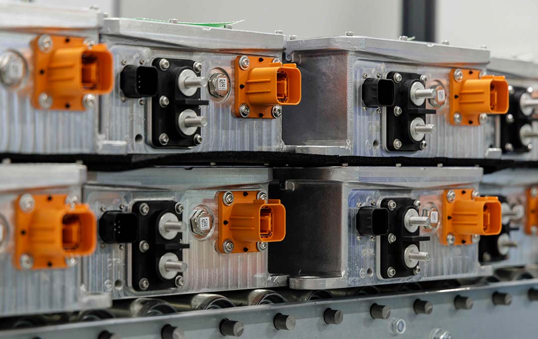 A stack of eMobility products on a conveyer belt